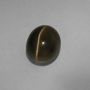 Cat's Eye Apatite طبيعي بلون أخضر ذهبي، وزن ‎5.70‎ قيراط، شكل بيضاوى، مقاس ‎10.7x8.8‎ مم