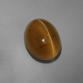 Cat's Eye Apatite طبيعي بلون ذهبي مخضر، وزن ‎9.54‎ قيراط، شكل شفاف، مقاس ‎14.4x10.5‎ مم
