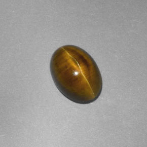 Cat's Eye Apatite طبيعي بلون ذهبي مخضر، وزن ‎2.23‎ قيراط، شكل شفاف، مقاس ‎8.6x6.3‎ مم