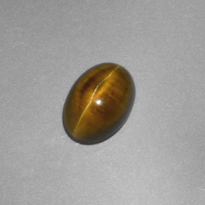 Cat's Eye Apatite طبيعي بلون ذهبي مخضر، وزن ‎2.23‎ قيراط، شكل شفاف، مقاس ‎8.6x6.3‎ مم