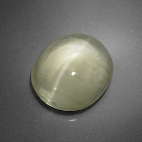 أباتيت عين القط أخضر ذهبى طبيعي، قصة بيضاوى، 5.09 قيراط، نصف شفاف