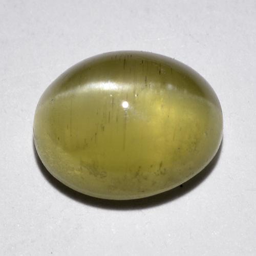 Cat's Eye Apatite طبيعي بلون أصفر فاتح، وزن ‎1.97‎ قيراط، شكل بيضاوى، مقاس ‎8.1x6.6‎ مم