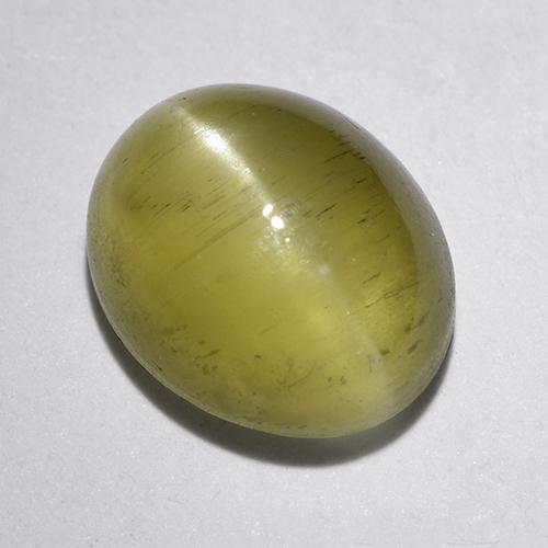 Cat's Eye Apatite طبيعي بلون أصفر فاتح، وزن ‎1.97‎ قيراط، شكل بيضاوى، مقاس ‎8.1x6.6‎ مم