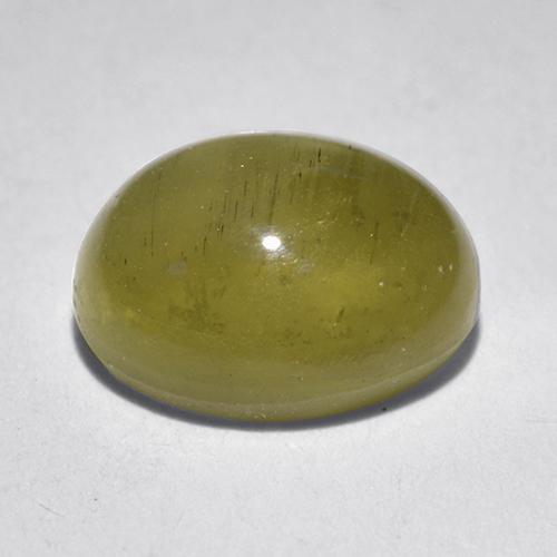 Cat's Eye Apatite طبيعي بلون أصفر فاتح، وزن ‎1.97‎ قيراط، شكل بيضاوى، مقاس ‎8.1x6.6‎ مم