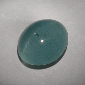 Cat's Eye Aquamarine طبيعي بلون أزرق-أخضر، وزن ‎11.55‎ قيراط، شكل شفاف، مقاس ‎15x12.8‎ مم