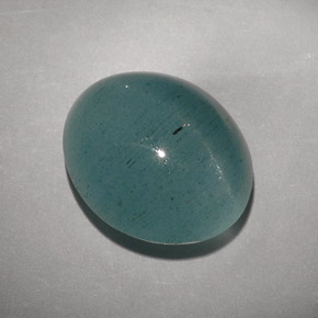 Cat's Eye Aquamarine طبيعي بلون أزرق-أخضر، وزن ‎11.55‎ قيراط، شكل شفاف، مقاس ‎15x12.8‎ مم