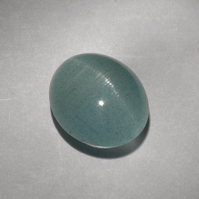 Cat's Eye Aquamarine طبيعي بلون أزرق-أخضر، وزن ‎8.31‎ قيراط، شكل شفاف، مقاس ‎12.7x10.9‎ مم
