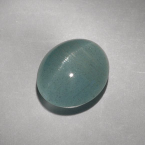 Cat's Eye Aquamarine طبيعي بلون أزرق-أخضر، وزن ‎8.31‎ قيراط، شكل شفاف، مقاس ‎12.7x10.9‎ مم