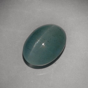 Cat's Eye Aquamarine طبيعي بلون أزرق-أخضر، وزن ‎6.79‎ قيراط، شكل شفاف، مقاس ‎13.4x9.8‎ مم