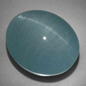 Cat's Eye Aquamarine طبيعي بلون أزرق-أخضر، وزن ‎22.18‎ قيراط، شكل بيضاوى، مقاس ‎17.9x15.1‎ مم