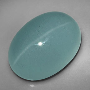 Cat's Eye Aquamarine طبيعي بلون أزرق-أخضر، وزن ‎12.39‎ قيراط، شكل شفاف، مقاس ‎17.1x12.3‎ مم