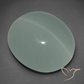 Cat's Eye Aquamarine طبيعي بلون Gray Forest Green، وزن ‎25.56‎ قيراط، شكل بيضاوى، مقاس ‎21.6x18.5‎ مم