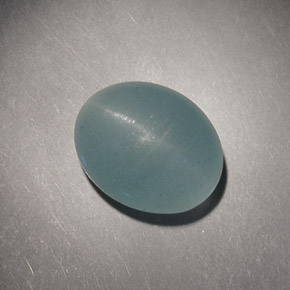 Cat's Eye Aquamarine طبيعي بلون أزرق-أخضر، وزن ‎4.98‎ قيراط، شكل بيضاوى، مقاس ‎10.9x8.8‎ مم