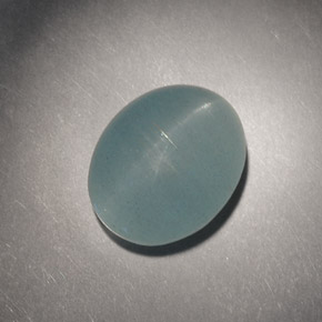 Cat's Eye Aquamarine طبيعي بلون أزرق-أخضر، وزن ‎4.98‎ قيراط، شكل بيضاوى، مقاس ‎10.9x8.8‎ مم