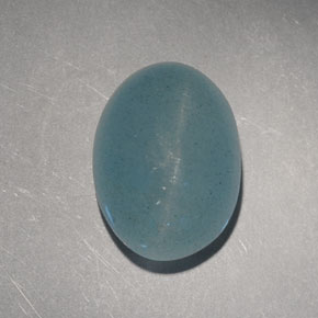 Cat's Eye Aquamarine طبيعي بلون أزرق-أخضر، وزن ‎6.60‎ قيراط، شكل بيضاوى، مقاس ‎12.9x9.4‎ مم