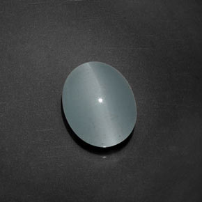 Cat's Eye Aquamarine طبيعي بلون أخضر-أزرق، وزن ‎5.17‎ قيراط، شكل بيضاوى، مقاس ‎12.4x9.4‎ مم