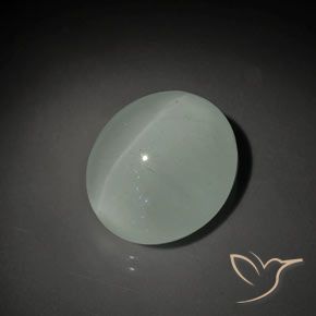 13.10ct طبيعي أخضر دافئ زبرجد عين القطة, بيضوي, شفاف