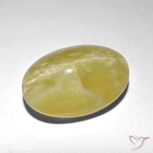 5.90ct طبيعي أصفر باهت أوبال عين القط, بيضوي, نصف شفاف