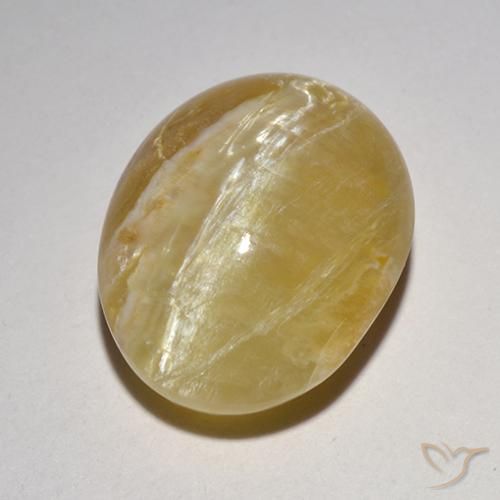 6.21ct طبيعي أصفر متوسط أوبال عين القط, بيضوي, نصف شفاف