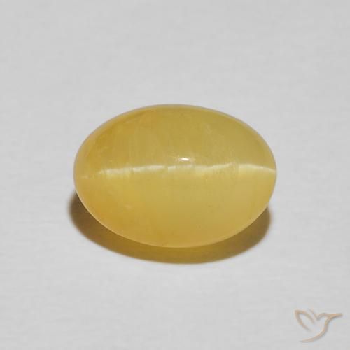 2.21ct طبيعي أصفر دافئ أوبال عين القط, بيضوي, غير شفاف