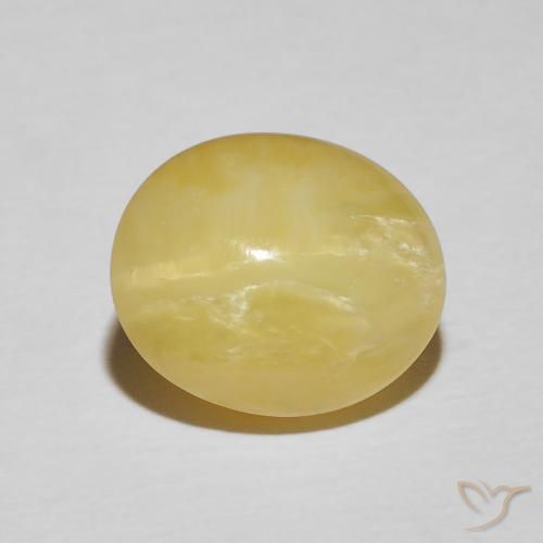 5.98ct طبيعي أصفر ترابى فاتح أوبال عين القط, بيضوي, غير شفاف