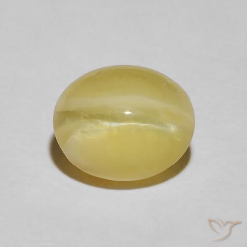 3.43ct طبيعي أصفر باهت أوبال عين القط, بيضوي, غير شفاف