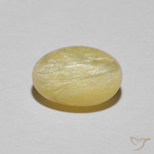 2.89ct طبيعي أصفر ديجون فاتح جدا أوبال عين القط, بيضوي, غير شفاف