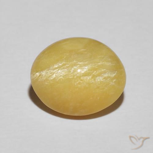 3.34ct طبيعي أصفر غنى أوبال عين القط, بيضوي, غير شفاف