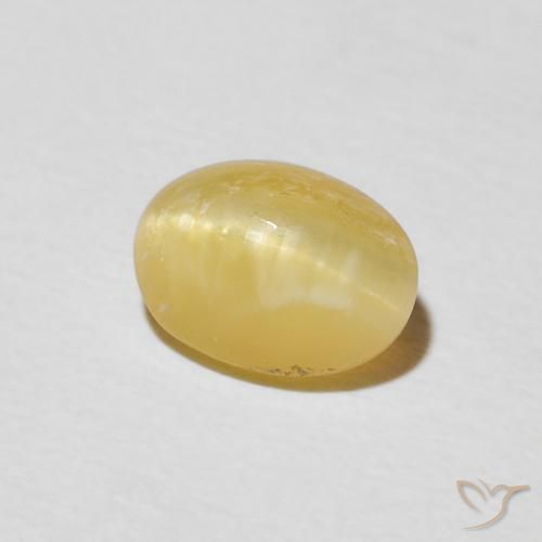 1.45ct طبيعي أصفر دافئ أوبال عين القط, بيضوي, غير شفاف