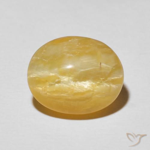 5.56ct طبيعي برتقالى-ذهبى أوبال عين القط, بيضوي, غير شفاف