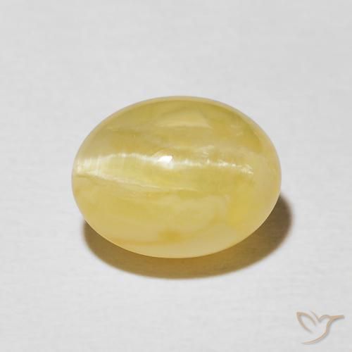 2.41ct طبيعي أصفر باهت أوبال عين القط, بيضوي, غير شفاف