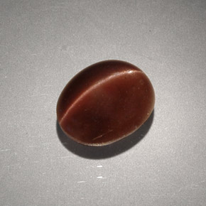 Cat's Eye Scapolite طبيعي بلون بني، وزن ‎2.56‎ قيراط، شكل بيضاوى، مقاس ‎9.1x7.3‎ مم