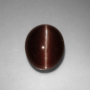 Cat's Eye Scapolite طبيعي بلون بني، وزن ‎3.52‎ قيراط، شكل بيضاوى، مقاس ‎10x8.4‎ مم