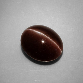 Cat's Eye Scapolite طبيعي بلون بني، وزن ‎3.52‎ قيراط، شكل بيضاوى، مقاس ‎10x8.4‎ مم