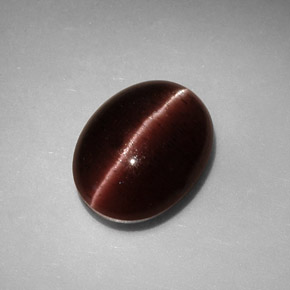 Cat's Eye Scapolite طبيعي بلون بني، وزن ‎3.41‎ قيراط، شكل بيضاوى، مقاس ‎10.5x8.1‎ مم