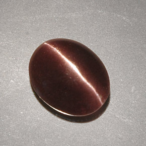 Cat's Eye Scapolite طبيعي بلون بني، وزن ‎2.32‎ قيراط، شكل بيضاوى، مقاس ‎9.7x7.9‎ مم