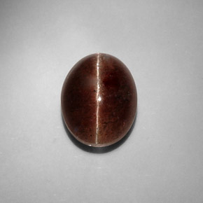 Cat's Eye Scapolite طبيعي بلون بني، وزن ‎8.31‎ قيراط، شكل بيضاوى، مقاس ‎13.4x10.3‎ مم
