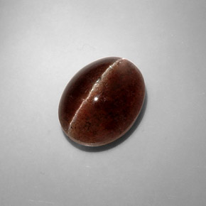 Cat's Eye Scapolite طبيعي بلون بني، وزن ‎8.31‎ قيراط، شكل بيضاوى، مقاس ‎13.4x10.3‎ مم