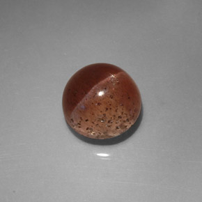 Cat's Eye Scapolite طبيعي بلون بني، وزن ‎2.31‎ قيراط، شكل شفاف، مقاس ‎7.5x7.3‎ مم