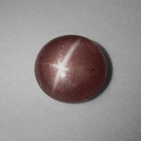 Cat's Eye Scapolite طبيعي بلون بني، وزن ‎1.54‎ قيراط، شكل دائري، مقاس ‎7.62‎ مم
