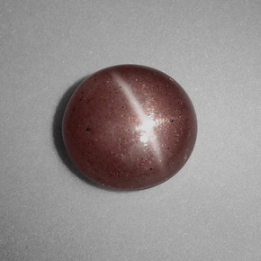 Cat's Eye Scapolite طبيعي بلون بني، وزن ‎1.54‎ قيراط، شكل دائري، مقاس ‎7.62‎ مم