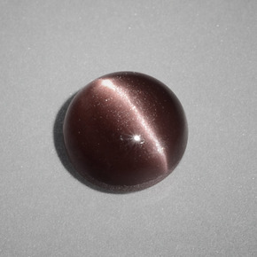 Cat's Eye Scapolite طبيعي بلون بني، وزن ‎1.58‎ قيراط، شكل دائري، مقاس ‎7.05‎ مم