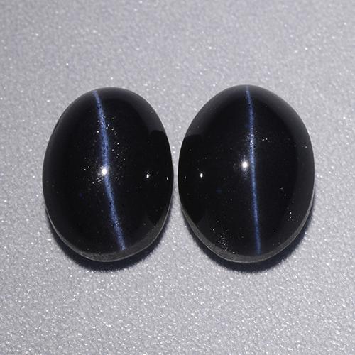 Cat's Eye Scapolite طبيعي بلون أسود، وزن ‎4.46‎ قيراط، شكل بيضاوى، مقاس ‎8.1x6‎ مم