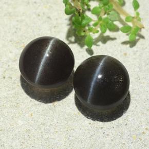 Cat's Eye Scapolite طبيعي بلون بني، وزن ‎4.77‎ قيراط، شكل دائري، مقاس ‎8.21‎ مم