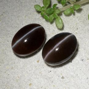 Cat's Eye Scapolite طبيعي بلون بني، وزن ‎2.53‎ قيراط، شكل بيضاوى، مقاس ‎7.9x5.6‎ مم