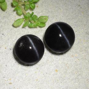 Cat's Eye Scapolite طبيعي بلون أسود، وزن ‎3.83‎ قيراط، شكل دائري، مقاس ‎7.16‎ مم
