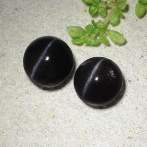 Cat's Eye Scapolite طبيعي بلون أسود، وزن ‎3.83‎ قيراط، شكل دائري، مقاس ‎7.16‎ مم