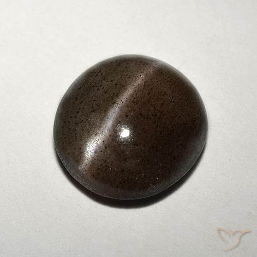 Cat's Eye Scapolite طبيعي بلون بنى متوسط، وزن ‎1.50‎ قيراط، شكل دائري، مقاس ‎7.71‎ مم