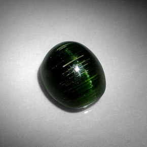 Cat's Eye Tourmaline طبيعي بلون أخضر عميق، وزن ‎4.67‎ قيراط، شكل بيضاوى، مقاس ‎10.5x8.7‎ مم