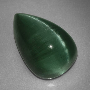 Cat's Eye Tourmaline طبيعي بلون أخضر عميق، وزن ‎2.46‎ قيراط، شكل شفاف، مقاس ‎10x6.5‎ مم